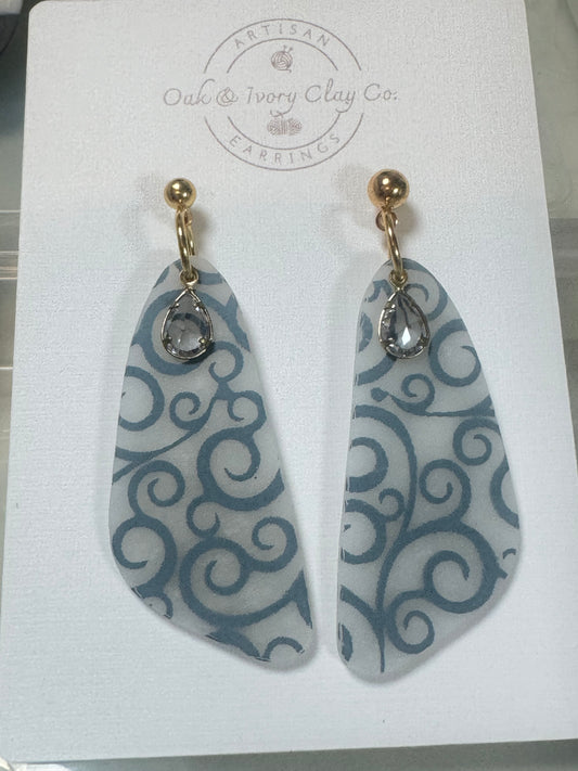Grey translucent earrings with crystals